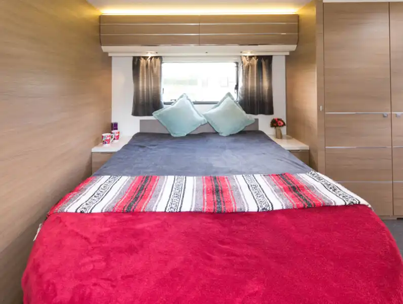 Lighting above the lockers and spotlights to focus on the silver stripes in the curtains; this is a superb bedroom (Click to view full screen)