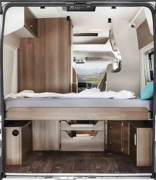 There's a double bed in the rear of the VanTourer (Click to view full screen)
