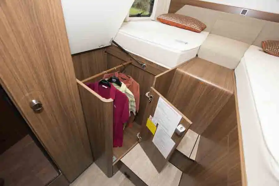 Handy wardrobe storage under the offside single bed (Click to view full screen)