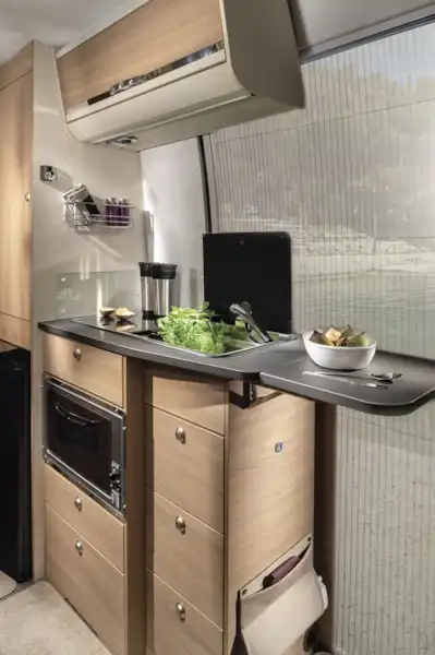 The kitchen in the Adria Twin Plus 600 SPB motorhome (Click to view full screen)