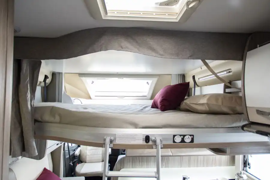 The drop down bed in the front of the Benimar Tessoro 482 motorhome (Click to view full screen)