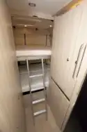 Ladder access to the top bunk bed in the Dreamer D53 Fun campervan
