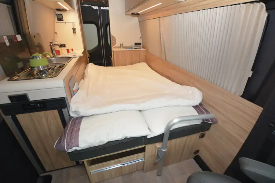 The fold down bed in the Hymer DuoCar S motorhome (Click to view full screen)